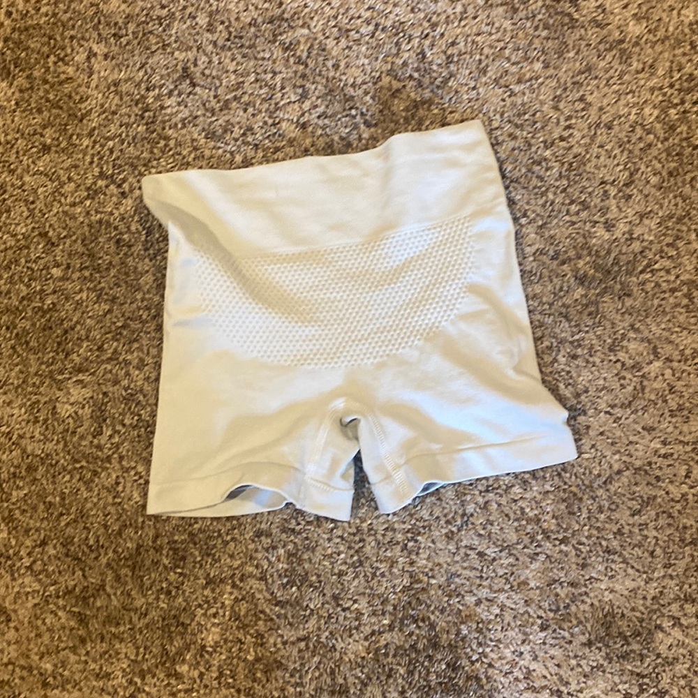 White booty scrunch shorts